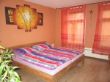Ihr kuscheliges Schlafzimmer mit Doppelbett (2,00x2,00m), Kleiderschrank und Sitzecke im Asia-Stil...